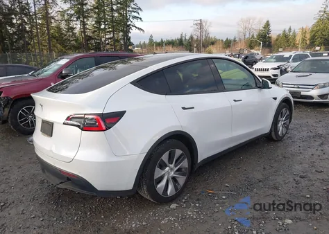 2021 Tesla Model Y Standard Range Rear-Wheel Drive из США, поврежденный, VIN 5YJYGDED7MF111122